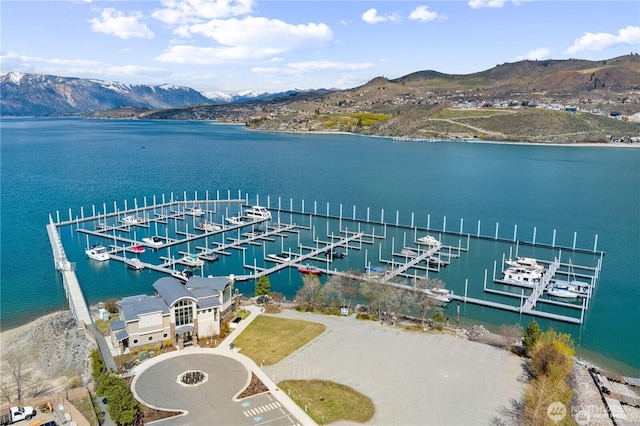 bird's eye view featuring a water and mountain view