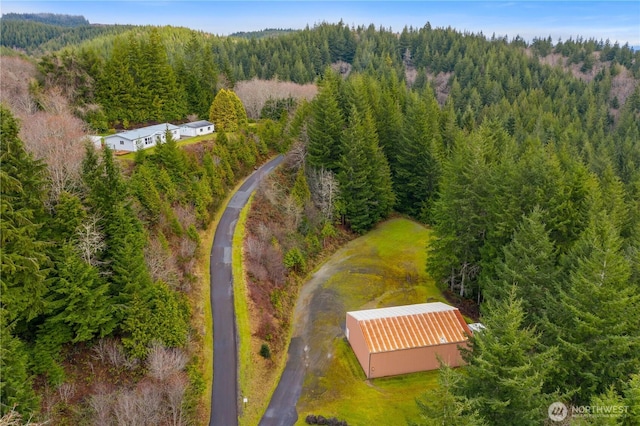 bird's eye view with a forest view