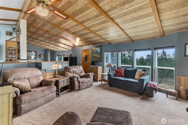 living room with lofted ceiling with beams, carpet flooring, and wooden ceiling