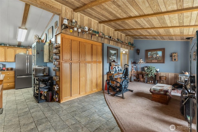 living room featuring wood walls, wooden ceiling, and vaulted ceiling with beams