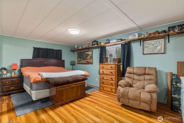 bedroom featuring light wood-type flooring