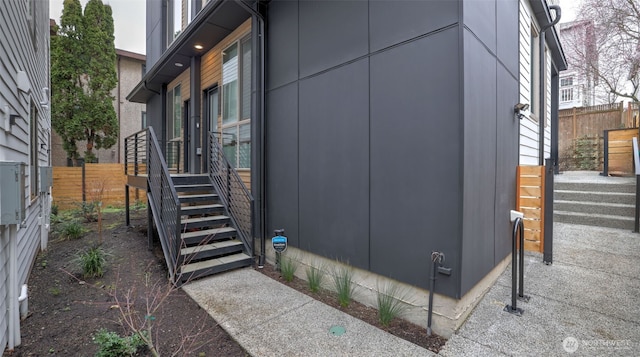 view of side of property with fence