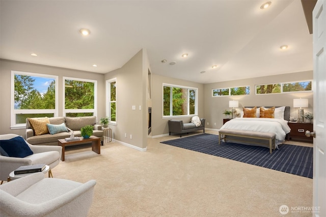 carpeted bedroom featuring recessed lighting and baseboards