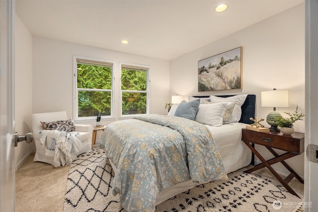 bedroom featuring recessed lighting, baseboards, and light colored carpet