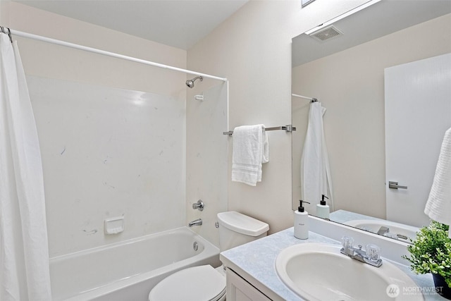 bathroom with vanity, shower / tub combo, toilet, and visible vents