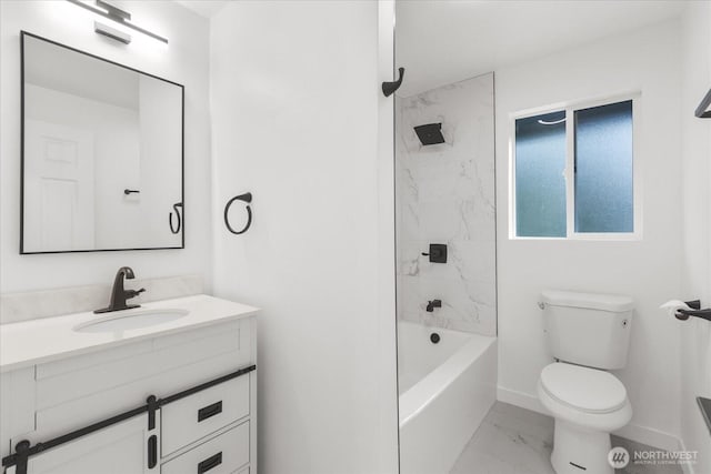 full bath with vanity, baseboards, toilet, marble finish floor, and shower / bathtub combination