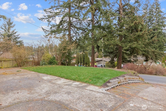 view of yard with fence