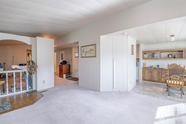 living area featuring carpet floors