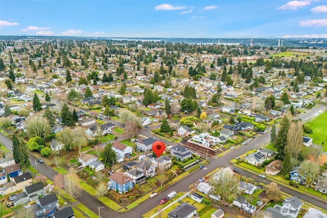 birds eye view of property with a residential view