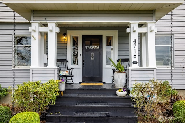 property entrance with a porch