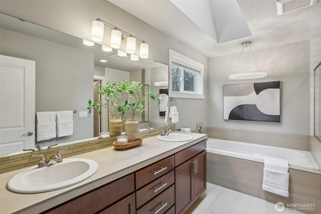 full bath with a sink, visible vents, double vanity, and a tile shower