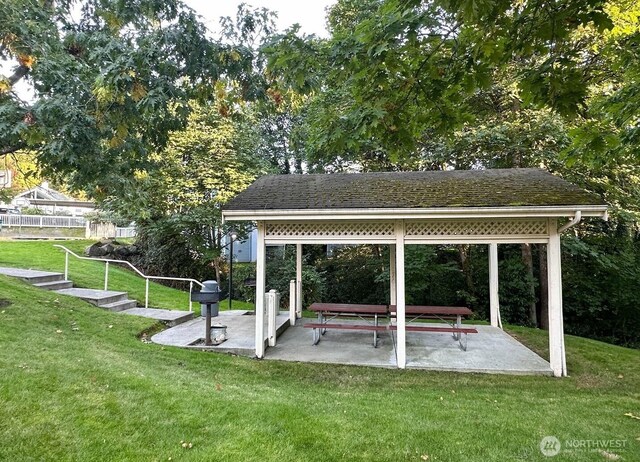 975 Aberdeen Ave NE Unit F407, Renton, WA 98056 - view of community featuring a patio area and a yard