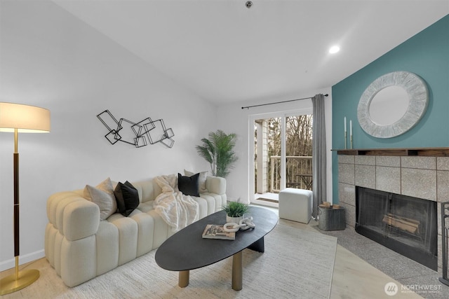 975 Aberdeen Ave NE Unit F407, Renton, WA 98056 - living room featuring recessed lighting, wood finished floors, and a tile fireplace