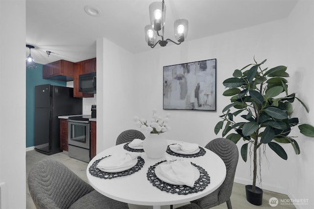 975 Aberdeen Ave NE Unit F407, Renton, WA 98056 - dining area with a notable chandelier