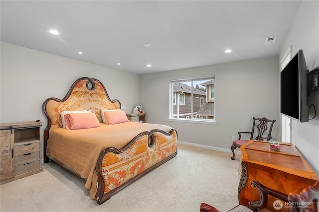 carpeted bedroom featuring recessed lighting, visible vents, and baseboards