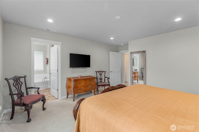 bedroom with recessed lighting, light colored carpet, and visible vents