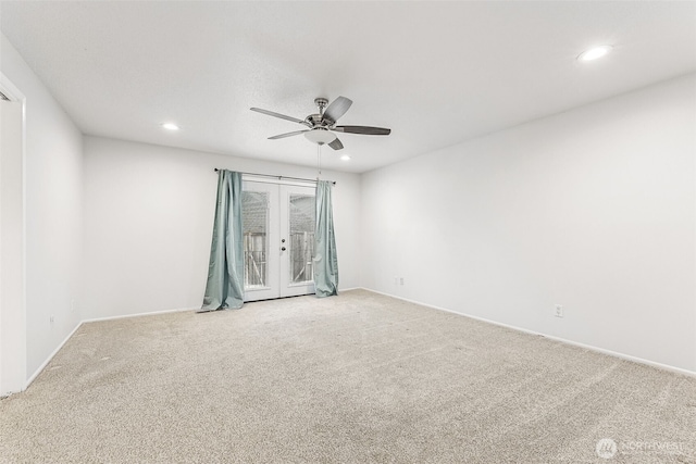 empty room with carpet flooring, french doors, recessed lighting, and ceiling fan