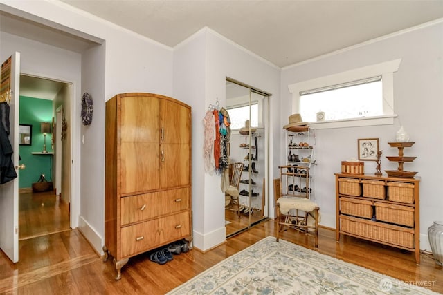 2029 S 7th St, Tacoma, WA 98405 - bedroom with wood finished floors, baseboards, a closet, and ornamental molding