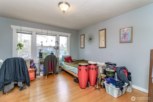 2029 S 7th St, Tacoma, WA 98405 - bedroom featuring wood finished floors and baseboards