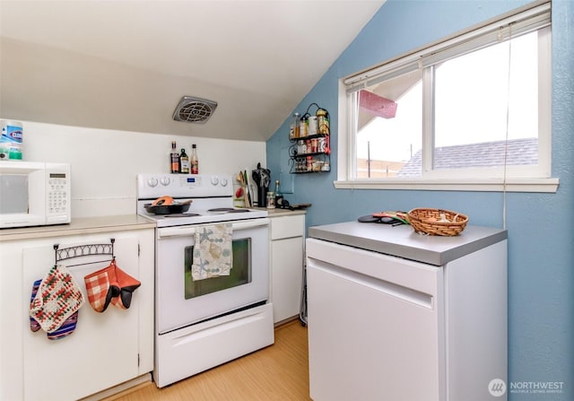 2029 S 7th St, Tacoma, WA 98405 - kitchen featuring white cabinetry, white appliances, and vaulted ceiling