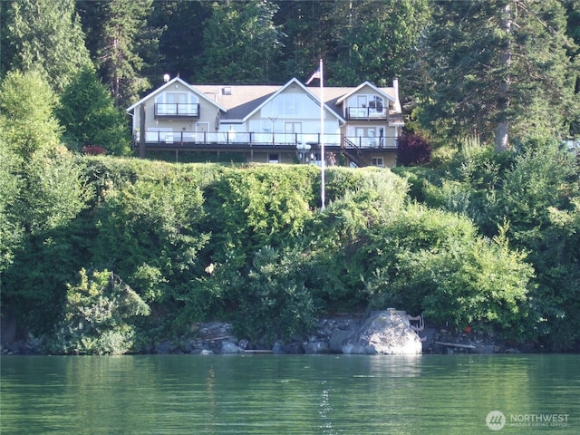 view of water feature featuring a wooded view