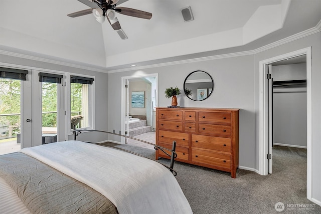 bedroom featuring access to exterior, crown molding, carpet flooring, a raised ceiling, and connected bathroom