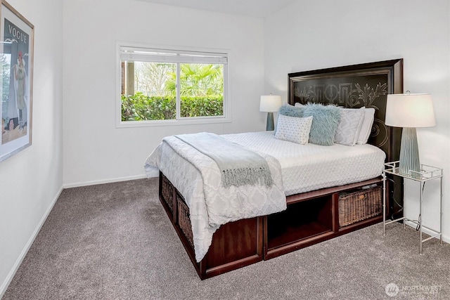 carpeted bedroom with baseboards