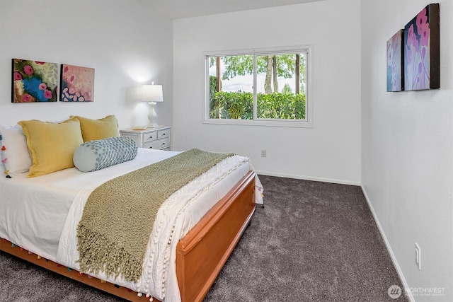 carpeted bedroom with baseboards