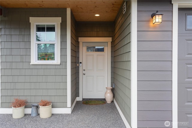 property entrance featuring a garage