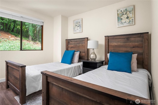 bedroom featuring wood finished floors
