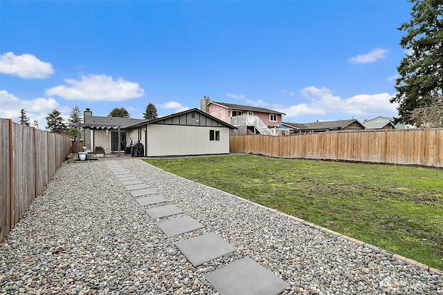 view of yard with a patio and a fenced backyard