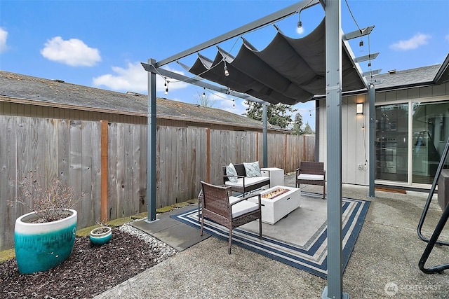 view of patio featuring a fire pit, a pergola, and a fenced backyard