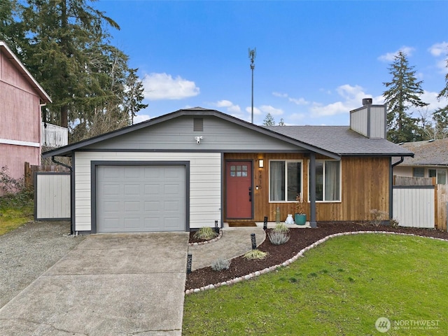 ranch-style home featuring fence, concrete driveway, a front yard, a chimney, and an attached garage