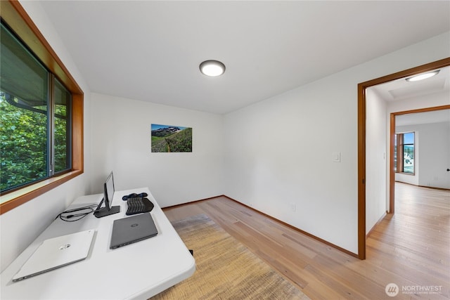 office area with light wood-type flooring