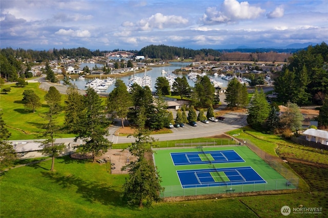 birds eye view of property featuring a water view