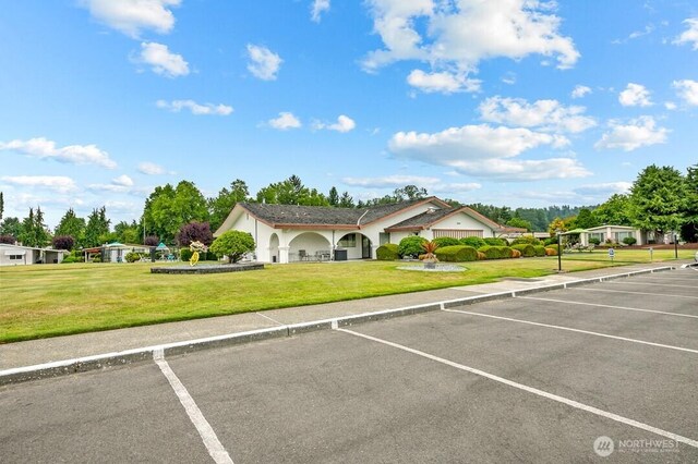 1402 22nd St NE Unit 402, Auburn, WA 98002 - view of uncovered parking lot
