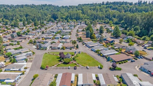 1402 22nd St NE Unit 402, Auburn, WA 98002 - bird's eye view featuring a forest view and a residential view