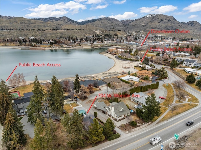 aerial view with a water and mountain view