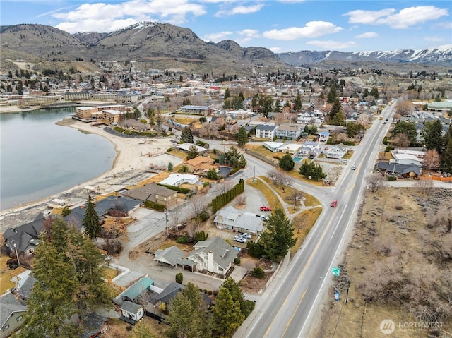 aerial view with a residential view and a water and mountain view