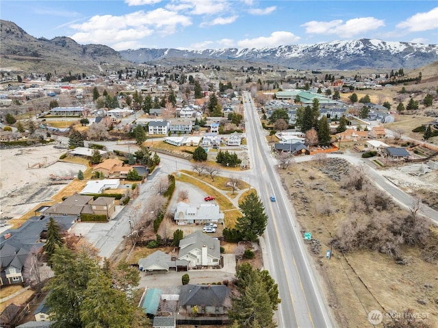 drone / aerial view with a mountain view and a residential view