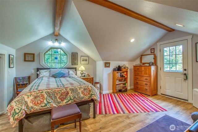 bedroom featuring wood finished floors and baseboards