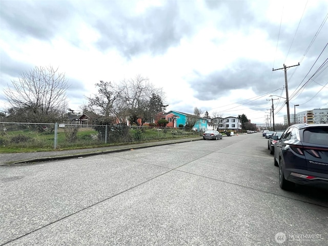 view of road featuring curbs and sidewalks