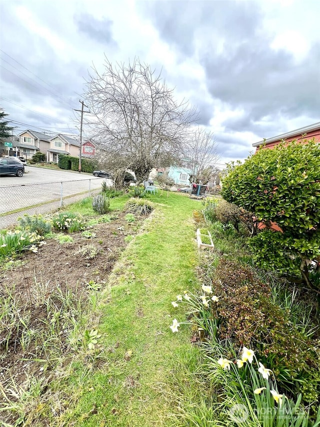 view of yard with fence