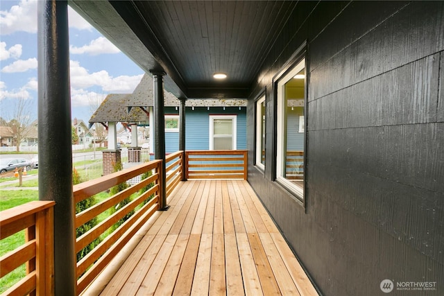 wooden deck featuring a porch