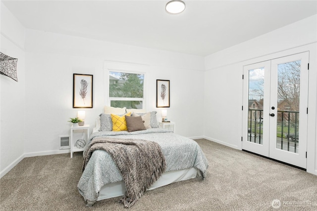 bedroom featuring access to outside, french doors, visible vents, and carpet floors