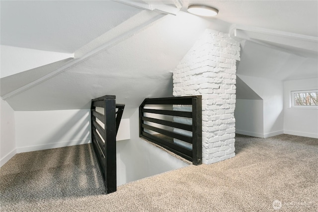 bonus room with baseboards, carpet floors, and lofted ceiling