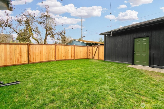 view of yard featuring a fenced backyard