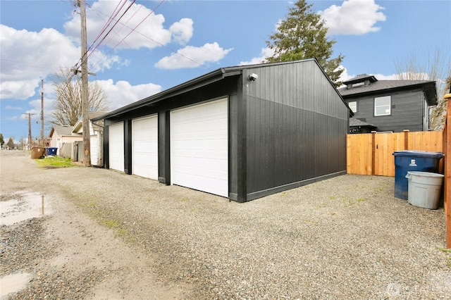 garage featuring fence