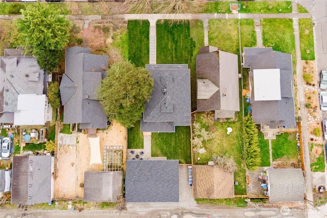 birds eye view of property with a residential view