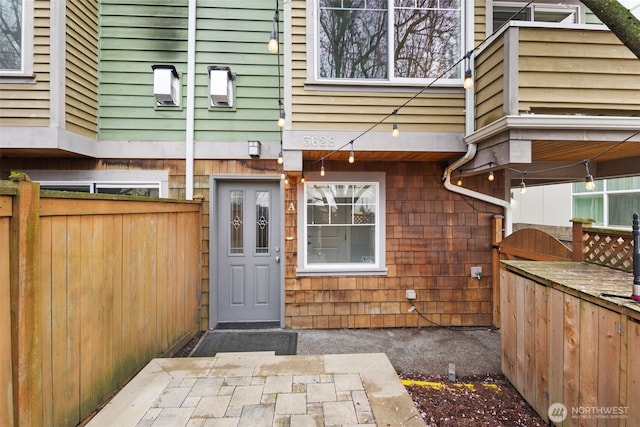 property entrance with fence